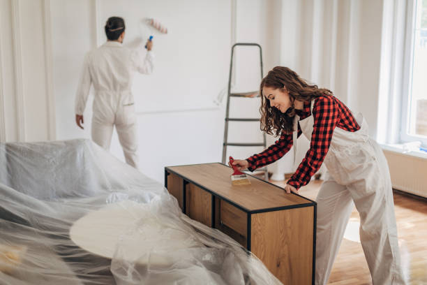 istock Couple renovating their home 1333357762