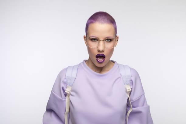 istock Angry female student with short purple hair 1333361456