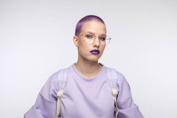 istock Confident female student with short purple hair 1333361881