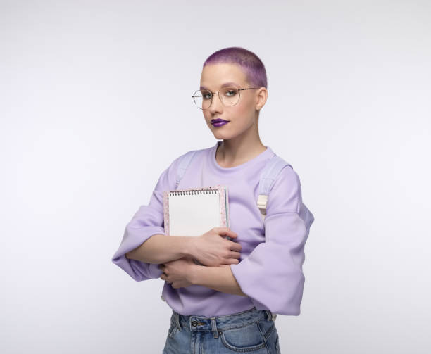 istock Friendly female student with short purple hair 1333363335