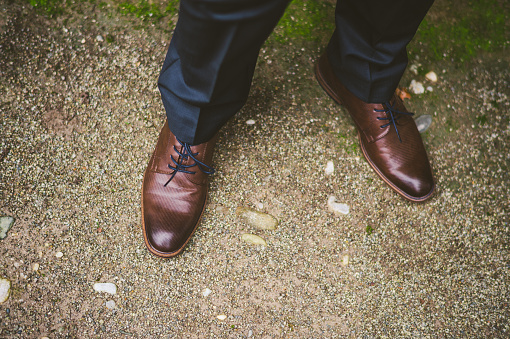 Brown shoes of a groom