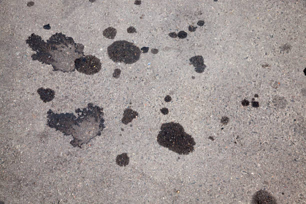 istock car oil stains on an asphalt road 1333364528