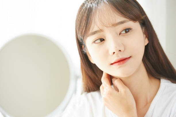istock A young Asian woman doing skin care 1333367331