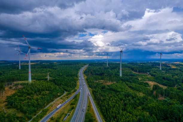 istock highway road interchange with wind turbines (aerial) 1333369005