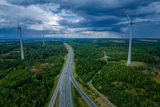 istock highway road interchange with wind turbines (aerial) 1333369013