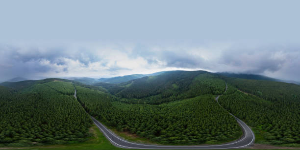 360 degrees spherical panoramic aerial view of beautiful mountains covered with green forest