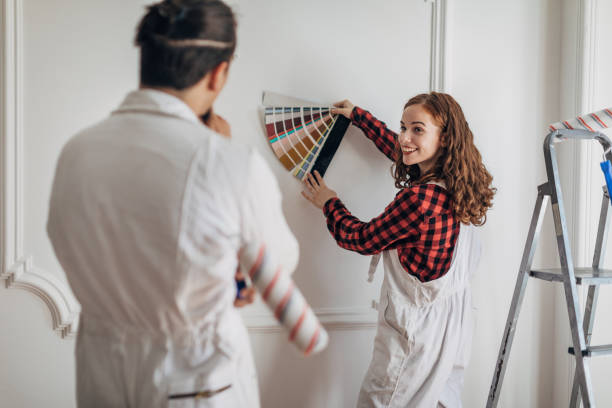 istock Couple choosing colors for walls 1333371691