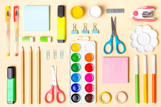 istock School or office supplies on yellow background. Concept back to school 1333371776
