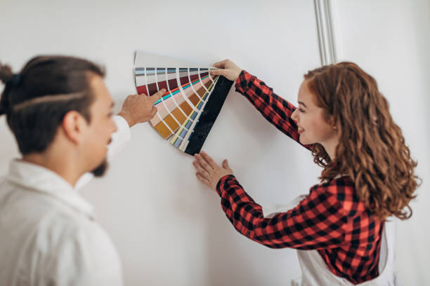 istock Couple choosing colors for walls 1333371805