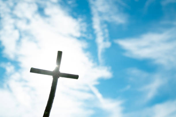 istock Blue Sky Background Wooden Cross 1333375778
