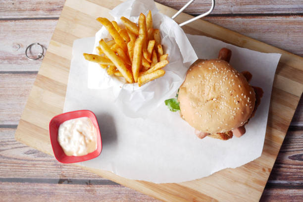 istock junk foods on a chopping board on wooden table top view 1333377236