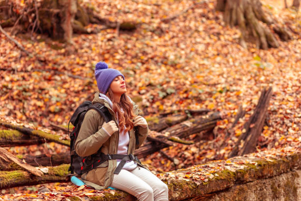 istock Woman relaxing outdoors on sunny autumn day 1333378220