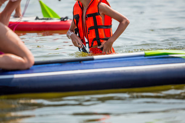 istock Boy in a life jacket for water sport on 1333378646