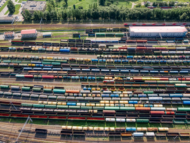 istock Aerial top view on railway terminal with various colorful cargo wagons. 1333379882