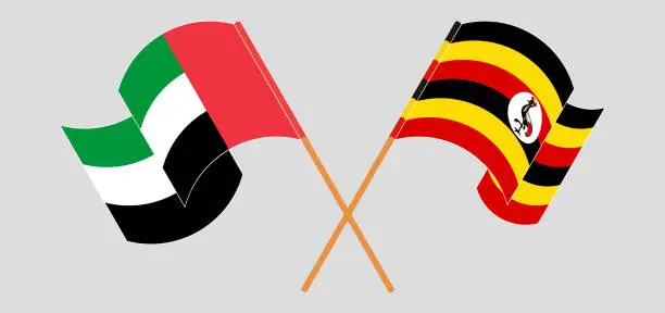 Vector illustration of Crossed and waving flags of the United Arab Emirates and Uganda