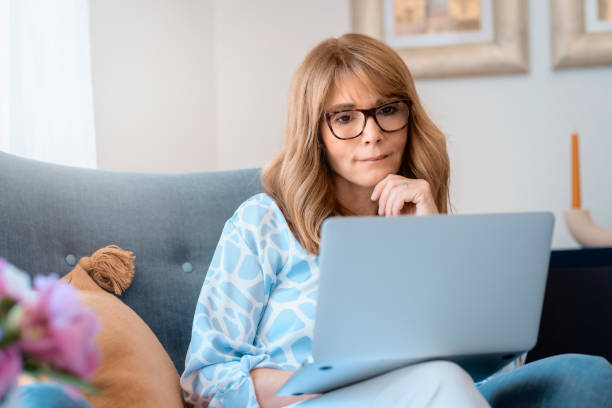 istock Attractive middle aged businesswoman working from home 1333385016