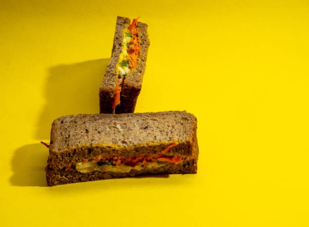 노란색 배경에 신선한 샌드위치 - club sandwich large bread breakfast 뉴스 사진 이미지