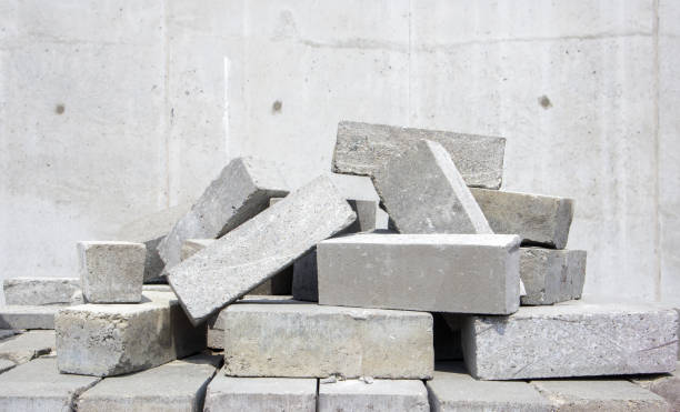 istock A pile of cement type bricks. Solid brick is used for construction. Lots of loose concrete bricks at the construction site 1333386754
