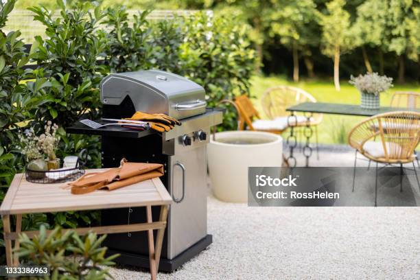 Backyard With Barbeque And Dining Table Stock Photo - Download Image Now - Barbecue Grill, Barbecue - Meal, Back Yard