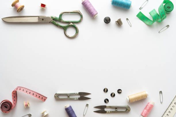 istock Flat lay composition with scissors and other sewing accessories on white background. Space for text 1333387180