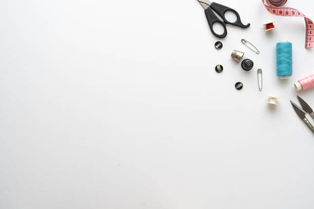 istock Flat lay composition with scissors and other sewing accessories on white background. Space for text 1333387306