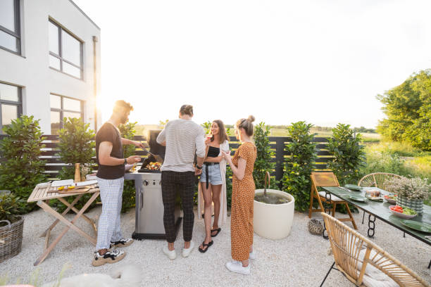 istock Friends grilling at backyard on a sunset 1333389211