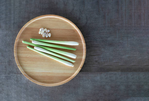 fresh lemongrass on a wooden tray
