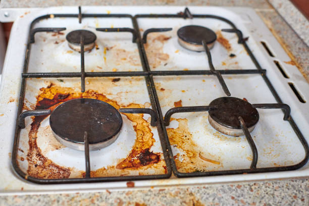 istock Dirty stove with food leftovers 1333393513