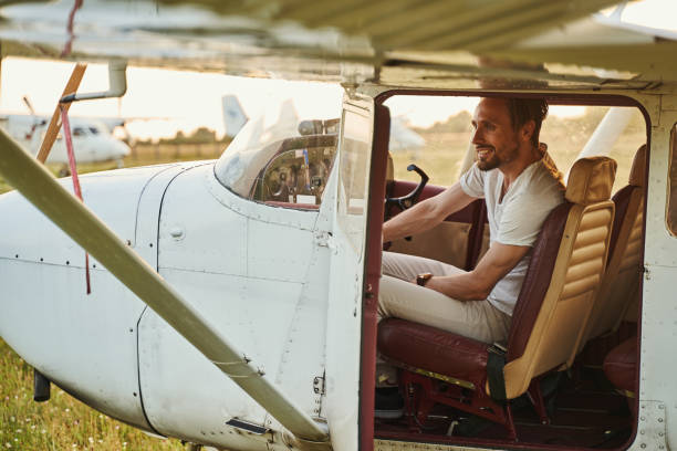 istock Focused photo on man sitting in plane 1333393843