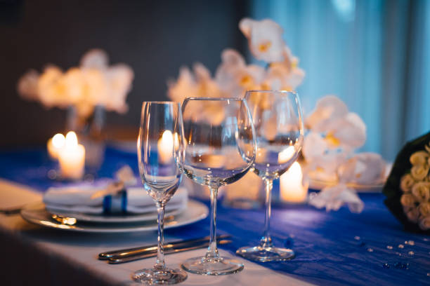 Wedding table decorations with orchids stock photo