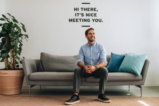istock Entrepreneur sitting in lobby and looking away 1333400022