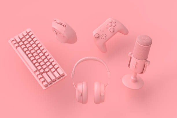 istock Flying gamer joysticks or gamepads on pink background 1333400530