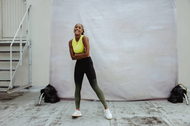 istock Female athlete relaxing after workout 1333400649
