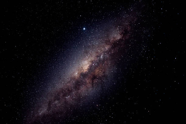 Magnificent capture of the milky way with brown hues. Galactic center in evidence stock photo