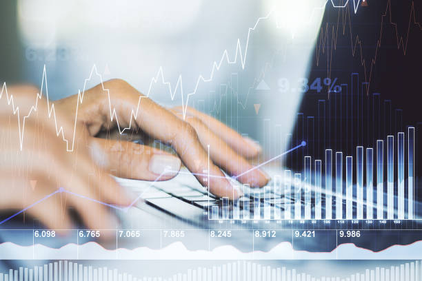istock Multi exposure of abstract financial diagram with hand typing on computer keyboard on background, banking and accounting concept 1333401869