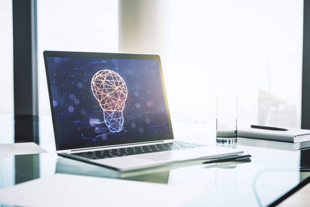 istock Modern computer monitor with creative light bulb hologram, research and development concept. 3D Rendering 1333401875