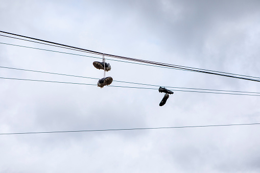 Two pairs of abandoned football boots