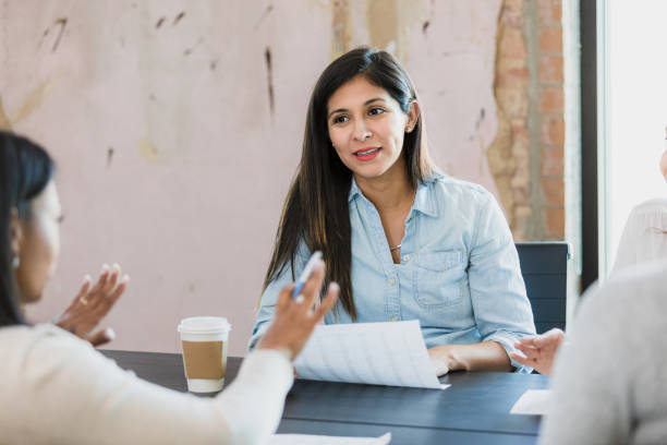 istock Women have heated discussion in meeting 1333403134