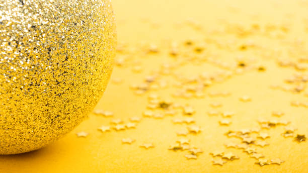 istock yellow new year festive background, christmas celebration mockup with copy space 1333405473