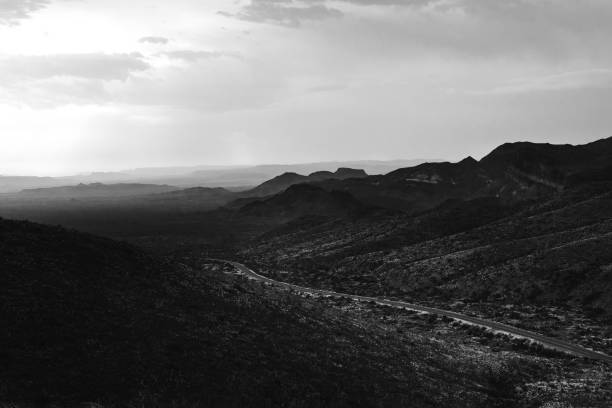 istock The mountain road in black and white 1333406532