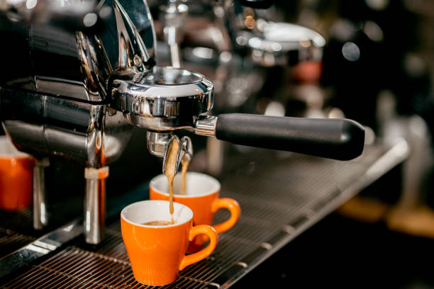 istock Barista making 2 espressos cups from the coffee machine 1333406730