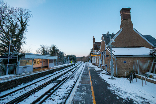Eynsford Railroad Station in Kent, England with commercial pictures visible in the shelter area