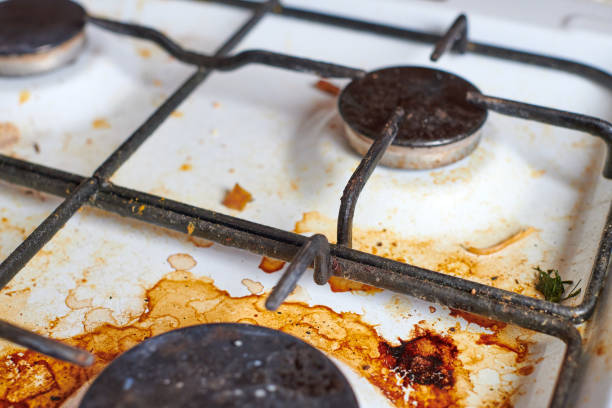 istock Dirty stove with food leftovers 1333409322