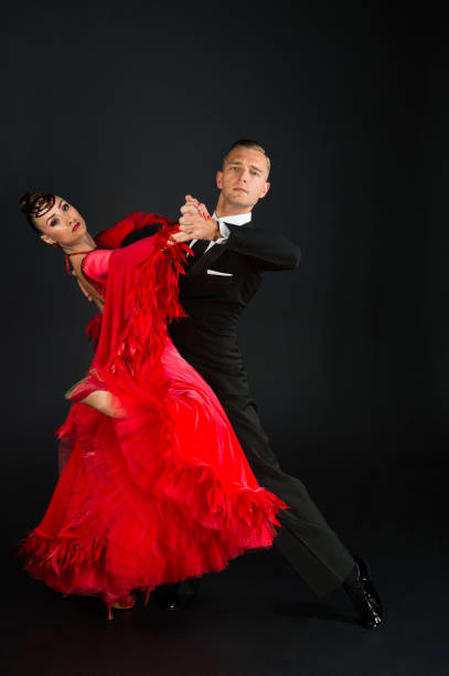 istock ballrom dance couple in a dance pose isolated on black bachground 1333412377