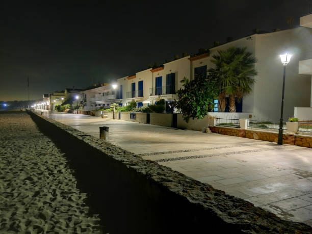 istock Walk parallel to altafulla beach at night. Tarragona - Parallel walk to Altafulla beach at night. Tarragona. 1333420103