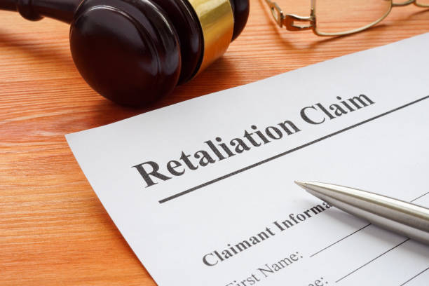 istock Retaliation claim lying on the desk with gavel. 1333421896