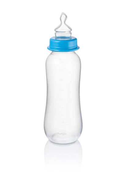 istock Long baby bottle, with blue ring without cap, isolated 1333423374