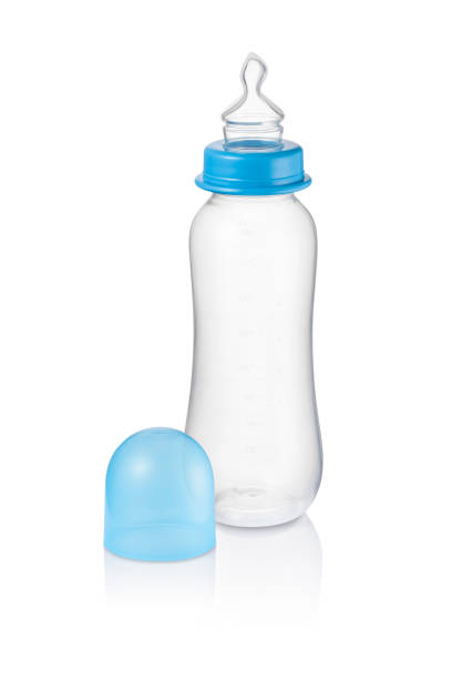 istock Long baby bottle with blue cap aside isolated 1333423382