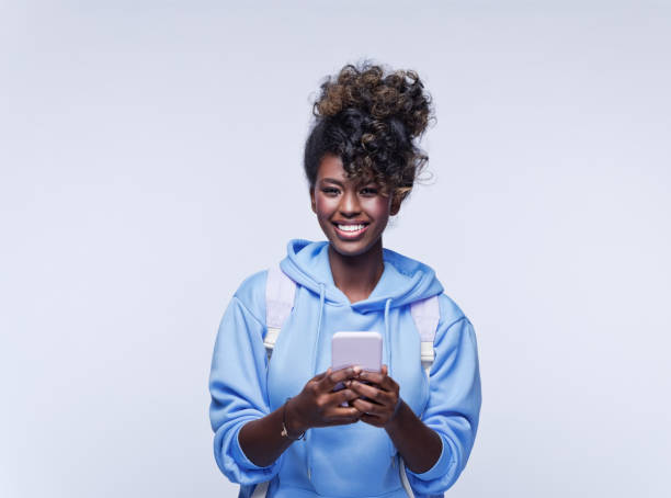 istock Cheerful female student in blue hoodie 1333428168