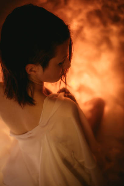 istock Young woman sitting on cloud 1333429716